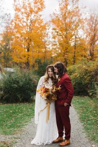 fall tree colors clamping wedding couple